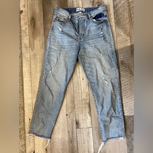 Barley worn - light wash, light destressing jean, mid-high rise jean